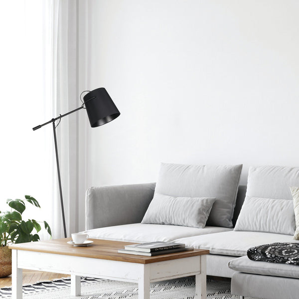Granadillos Floor Lamp By Eglo - Black Color along with the sofa