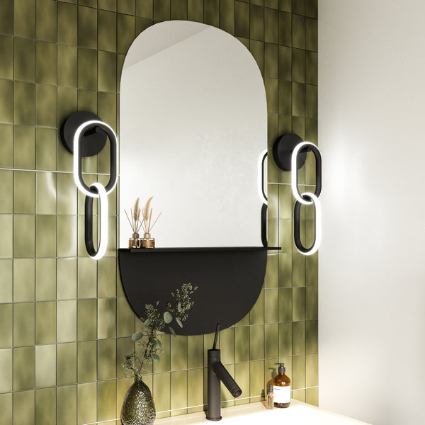 Airen Wall Light by Kuzco - Black along side of mirror