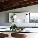 Arcadia Pendant by Kuzco - Black Opal Glass hanging in kitchen