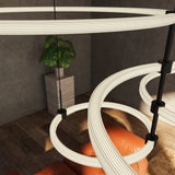 Bruni Multi Light Chandelier by Kuzco - Black, Hanging above on sofa