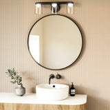 Cedar Vanity Light by Kuzco - Black, 3 Lights above on mirror in bathroom