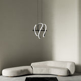 Collide Linear Pendant by Kuzco - Small, Black hanging over on couch