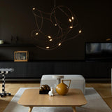 Small Brass/Bronze Flock of Light Suspension in Living Room