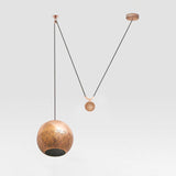 Copper Nur Reversed counterbalance weight Pendant Light by Dounia Home