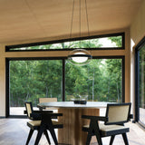 Virgo Pendant By Kuzco - Black/Opal Hanging Above Table