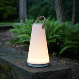 Uma Sound Lantern Table in garden