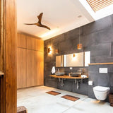 Tersus Wood Wall Sconce in bathroom